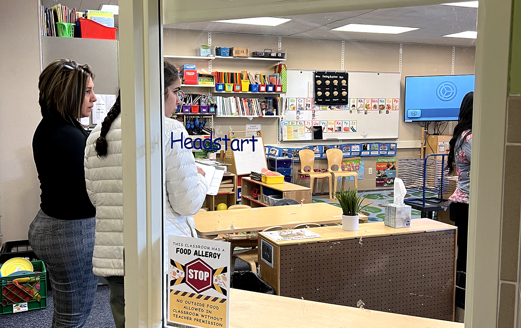 A Head Start preschool classroom seen from the doorway during a site visit